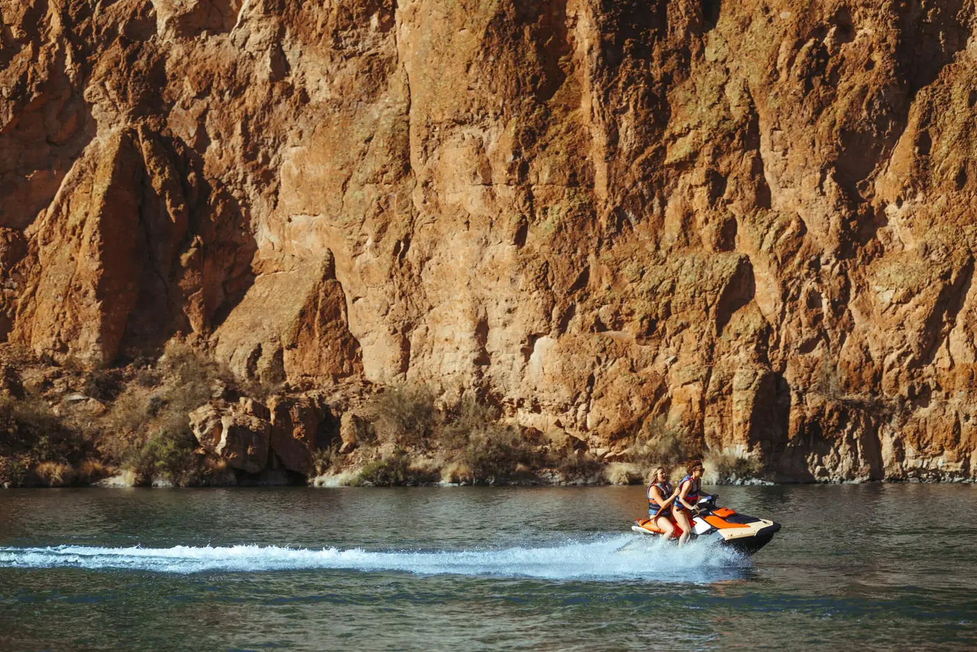 Family riding a jet ski together on Canyon Lake
